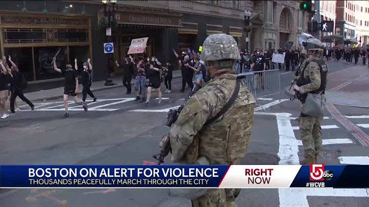 Thousands march through Boston streets under watchful eye of National Guard