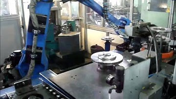 Robotic cell for checking brake discs