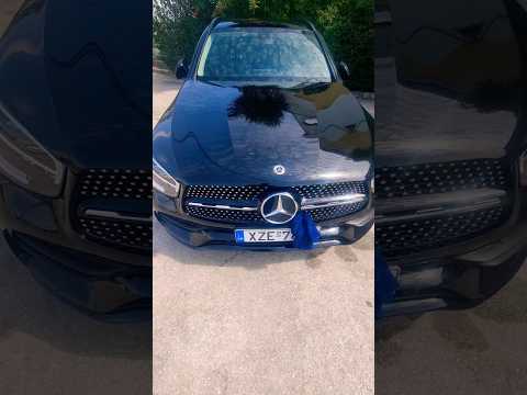 the black Mercedes