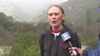 Couple/dog rescued from arroyo seco flood