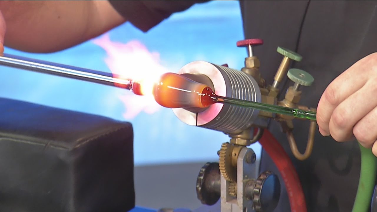 Live demonstration: Artist uses torch to blow glass flower 