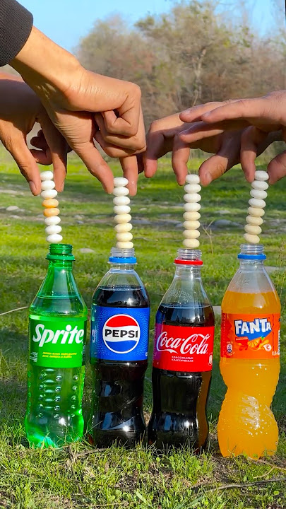 “Comparing explosions: Mentos vs. Coke and Pepsi!” 🔥 #experiment #cokevsmentos