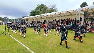 The Lonach Highlanders march in to 2025 Lonach Gathering and Highland Games in Strathdon Scotland screenshot 3