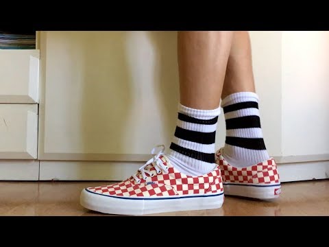 red checkerboard vans on feet