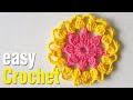 Easy Crochet: How to Crochet a Puff Stitch Flower Coaster Motif for beginners. Free coaster pattern.