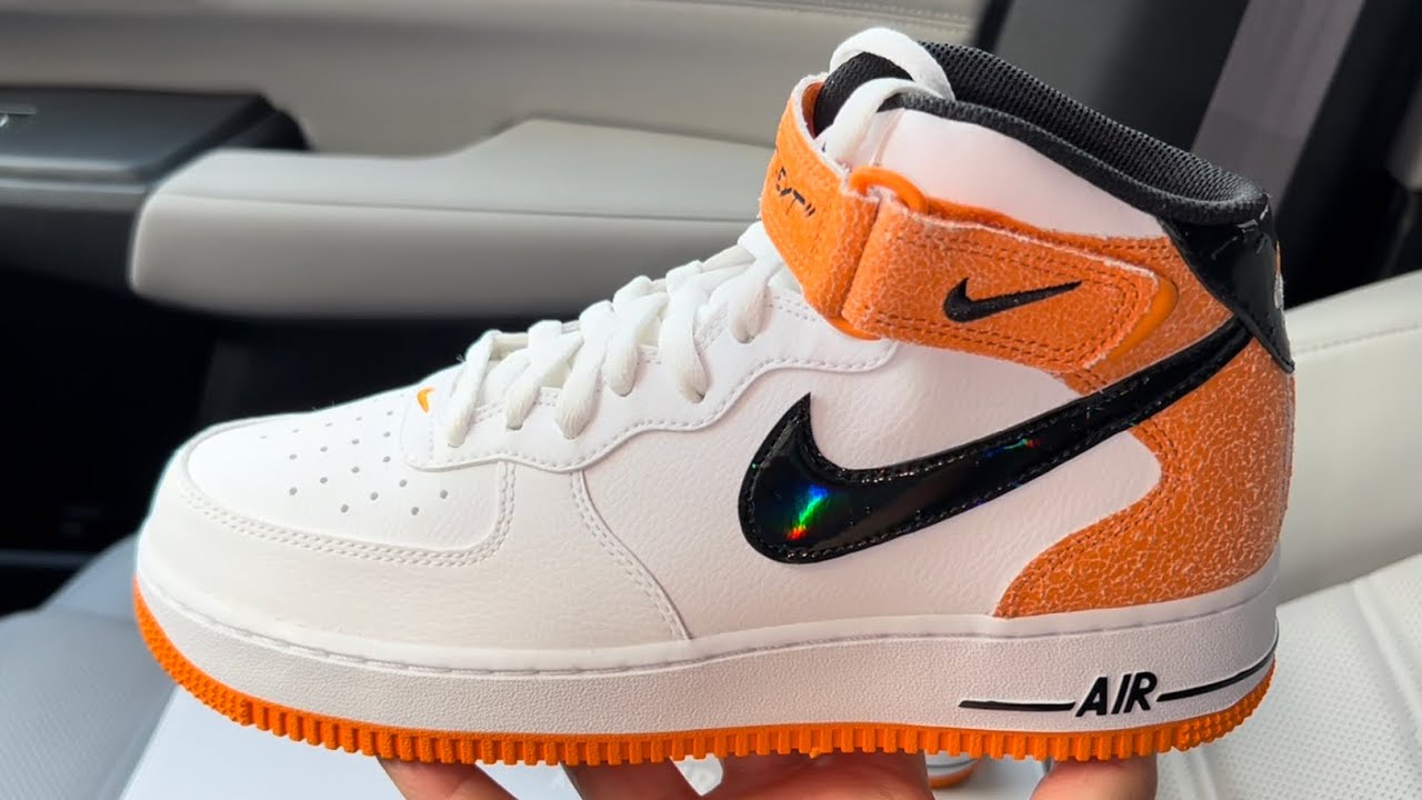 orange white and black air force ones