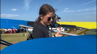 14 year old Alina preflights her Aerolite Ultralight at Oshkosh 2023