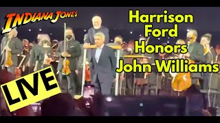 John Williams plays Indiana Jones theme live, Harrison Ford walks on stage.