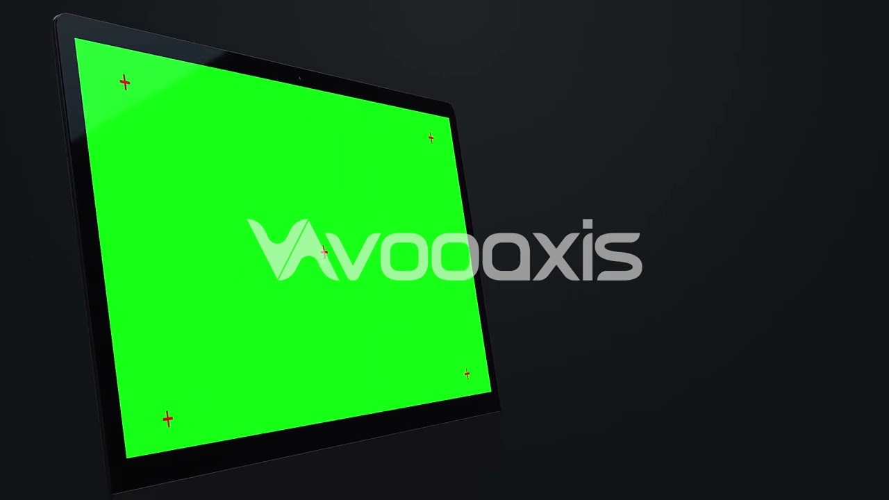 Desktop computer with green screen mock up in dark background