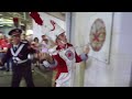 Ohio State Marching Band drum major John LaVange performs the "three-knock" tradition prior to the M