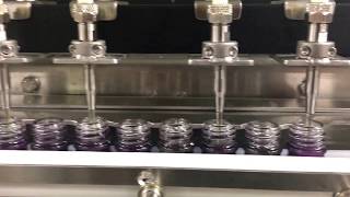 Fully Automatic Micro Dosing Piston Filler For 15 ml. Bottles