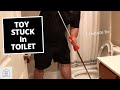 How to unclog a toilet using a RIDGID 3 FT. Toilet Auger (59787)