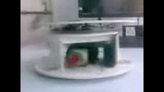 Robot Like Table Turner -Wheeled Robot controlled using remote Atmega32 Micro-controller