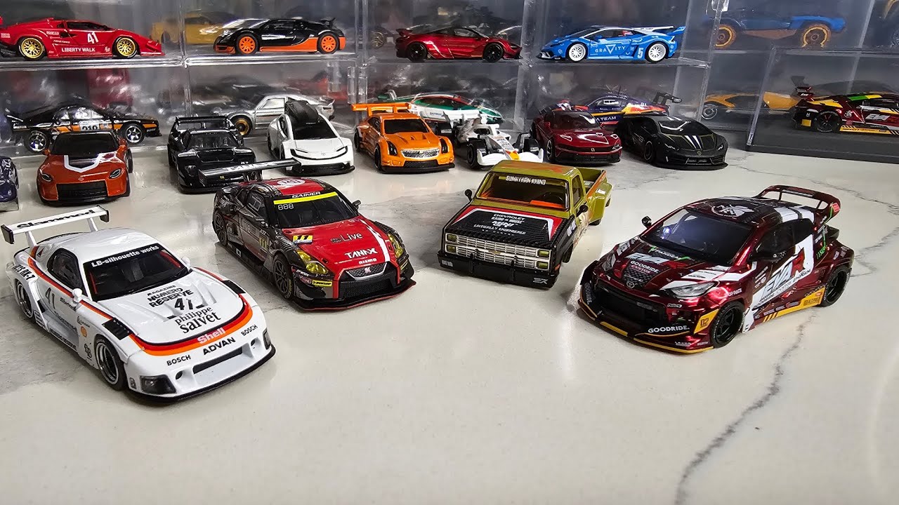 Diecast cars: Gainer Tanax GT-R, Eva R Yaris, Silverado - Sumatran Rhino, LBWK RX-7 Philippe Salvet