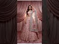 Step into the room and own every glance in our Pink Floral Embroidered Net Lehenga — delicate emb...
