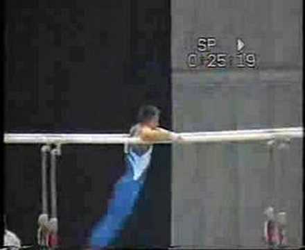 parallel bars.back uprise to support + cut fwd.