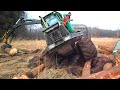 John Deere 810D stuck in deep mud