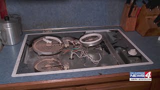 Grandmother says power surge caused stove to explode