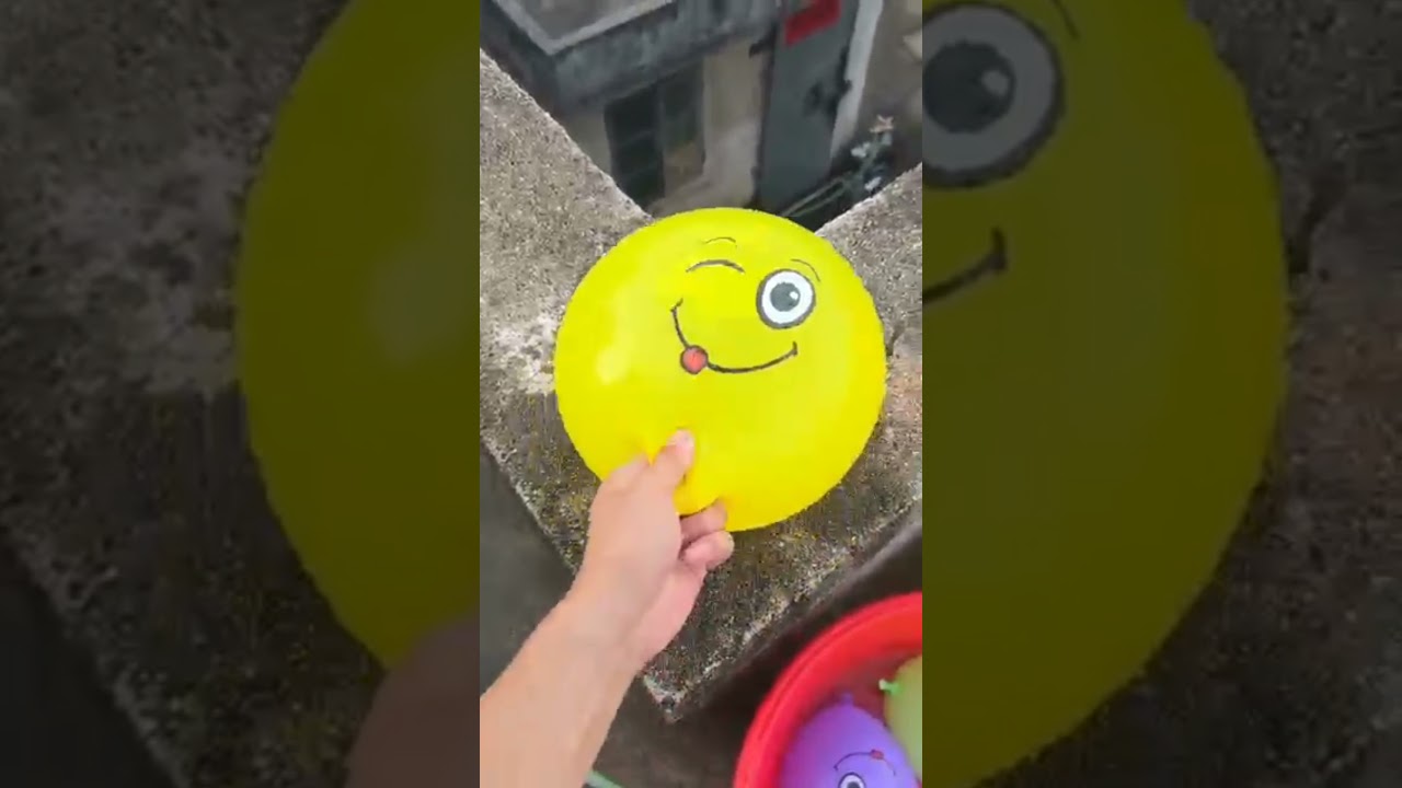 What Happens When You Drop a Balloon from a Rooftop? 🎈💥 