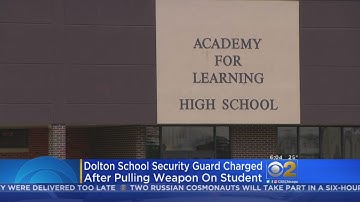 Security Guard Charged With Grabbing Student By The Neck, Pointing Gun