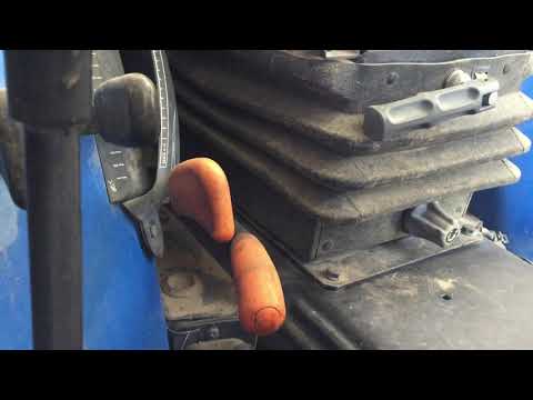 Video: Encendido En Un Tractor De Conductor A Pie: ¿cómo Configurar Y Ajustar? ¿Cómo Reviso Las Bujías Y Los Engranajes?