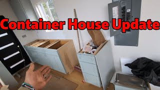 container House update and talking about cost- snap lock roof, ductless heat system, flooring, etc