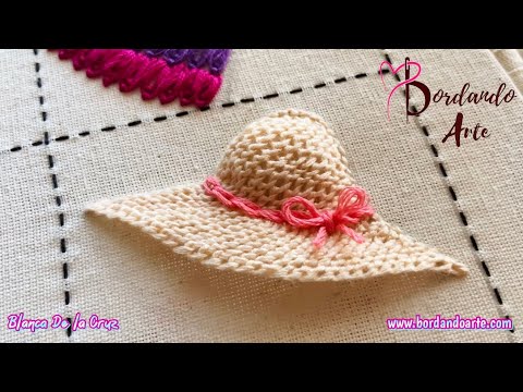 Bordar a mano sombrero con punto pequinés