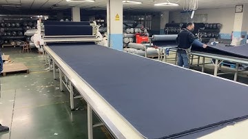 Automatic fabric spreading vs manual spreading