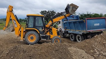 JCB Backhoe Machine Loading Gravel in Dump Truck - JCB 3DX Machine Working on Sandy Place