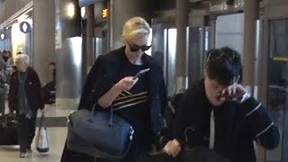 Charlize Theron Catches A Flight Out Of LA As Relationship With Brad Pitt Blossoms - EXCLUSIVE