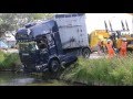 Vrachtwagen te water door ongeluk aan de Burgerweg