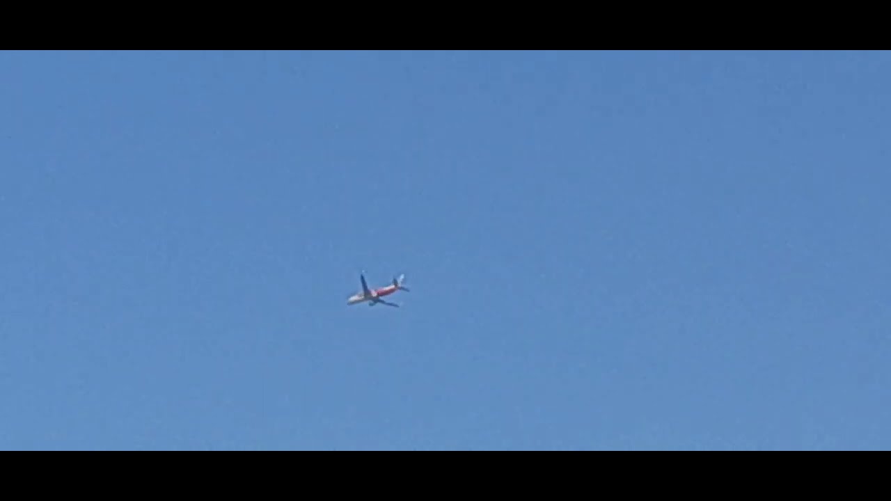 Top Plane Spotting Moments Air India's training flight shines in blue sky. 