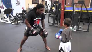 Dewey Cooper complete training lesson with amateur boxer