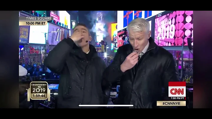 ANDERSON COOPER TAKES SHOT ON NYE