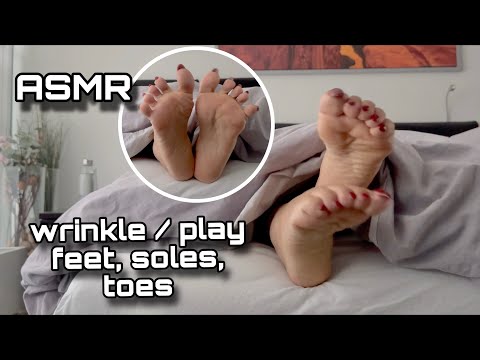 ASMR feet relax on bed.