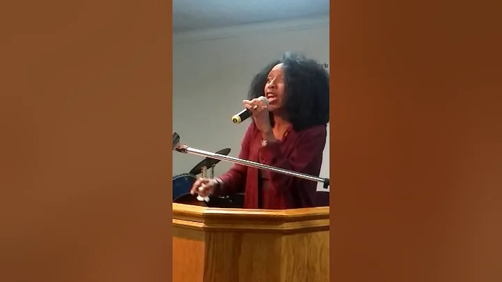 Evangelist Deborah Madden singing He's a on-time God