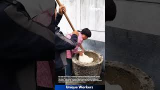Traditional Mochi Making: Pounding Rice Dough with a Wooden Mallet