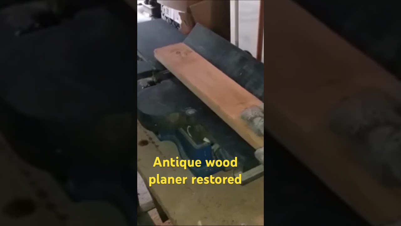 Using a restored antique wood planer. 