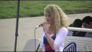 16-yr-old speaks her mind, sings "God Bless the U.S.A." chords