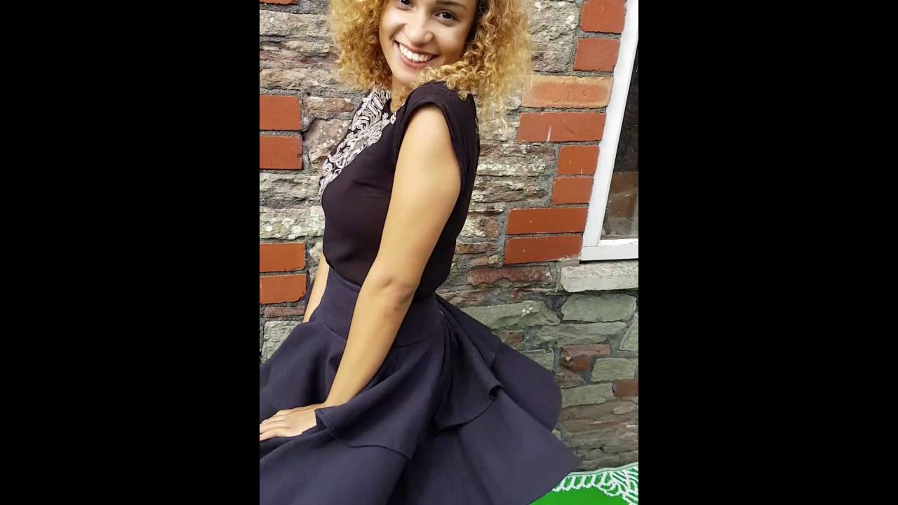 MODEL TWIRLING IN SKIRT FROM TOYAH'S VINTAGE 1980S WARDROBE