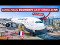 BRUTALLY HONEST | Flying Air France&#39;s Boeing 777-300ER in ECONOMY from Los Angeles to Paris CDG!