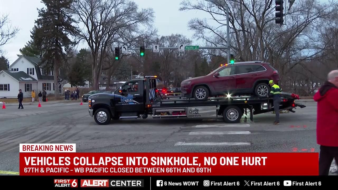 BREAKING: Two Vehicles Trapped in Sinkhole in Omaha's Aksarben Area