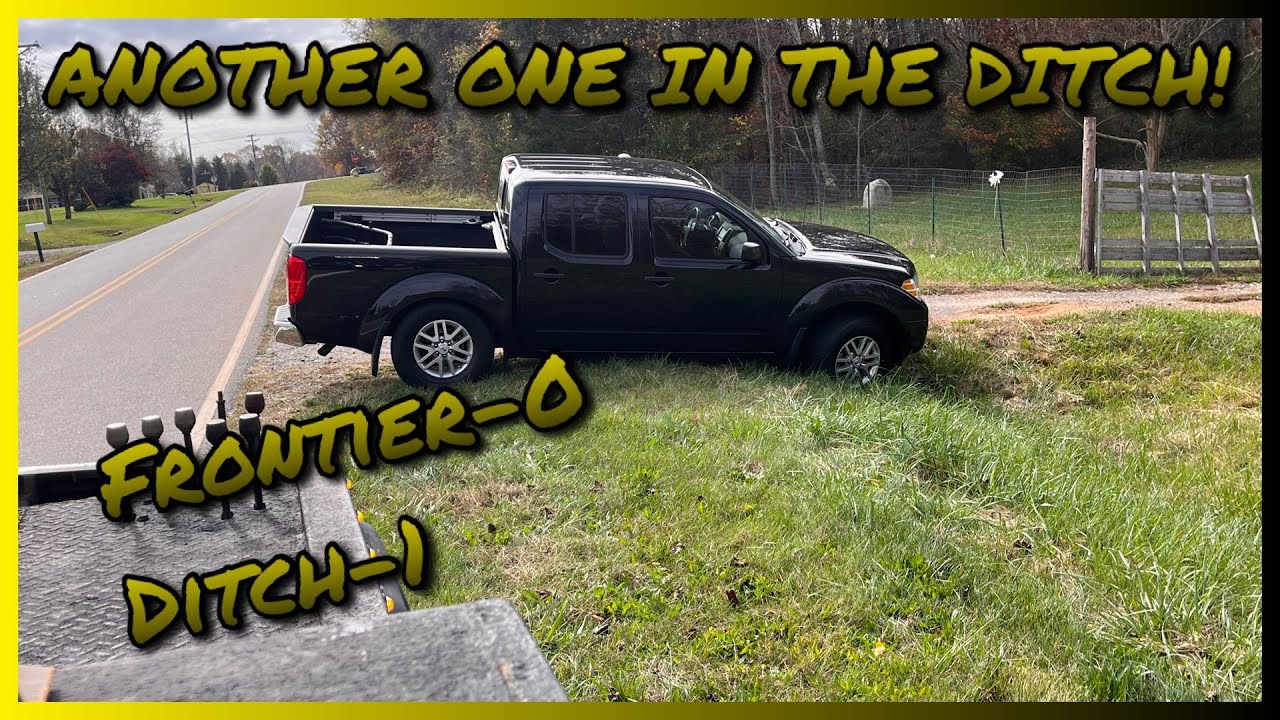 Nissan Frontier stuck in a ditch. - YouTube