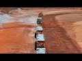 Road Train side tippers and Watercarts working together