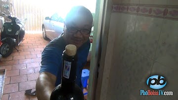 Làm sao mở nút chai rượu vang khi không có đồ khui?