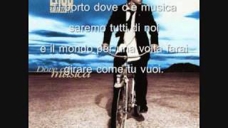 Video thumbnail of "Eros Ramazzotti - Dove C'e Musica + Lyrics"