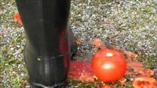 Me squishing some tomatoes