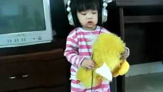super sleepy Chinese little girl dozing off 