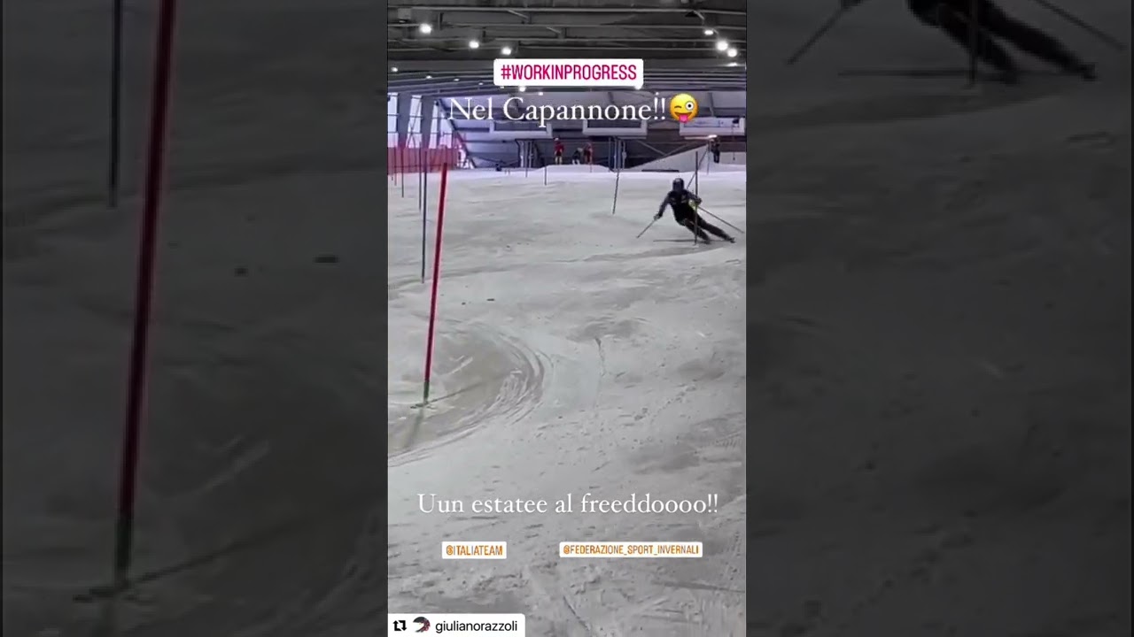 Giuliano Razzoli fast smooth slalom skiing indoors at Peers Belgium alpine skier of Italy ski on ice