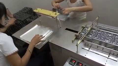 Semi-automatic cellophane wrapping machine